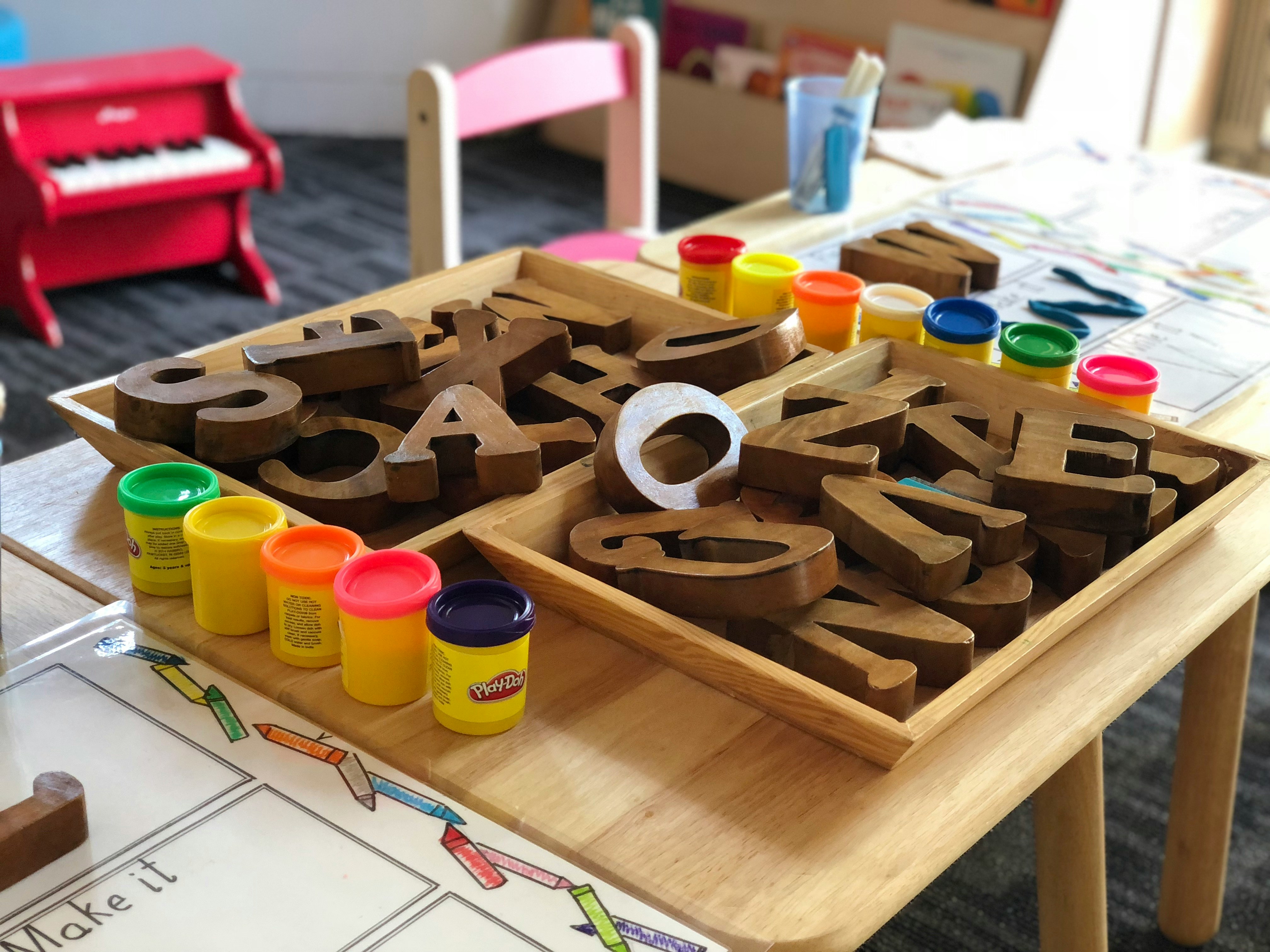 Parent and child looking at kindergarten classroom